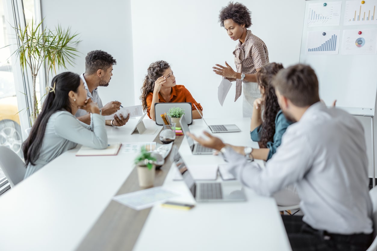 Coworkers having an intense meeting about crisis management