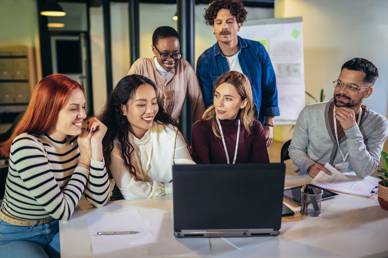 Group of cultural diverse business people working together in the office.